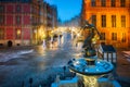 Neptune Fountain and a Christmas decorations in snowy old town of GdaÃâsk. Poland Royalty Free Stock Photo