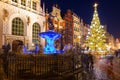 Neptune Fountain and a Christmas tree in the old town of GdaÃâsk. Poland Royalty Free Stock Photo