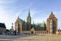 Neptune Fountain in a front of Frederiksborg castle courtyard facade in Hillerod, Denmark Royalty Free Stock Photo