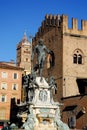 Neptune Fountain illuminated by the morning sun in the city center in Bologna in Emilia Romagna (Italy) Royalty Free Stock Photo