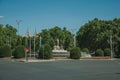 Neptune fountain among leafy trees in Madrid Royalty Free Stock Photo