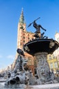 Neptune Fountain with Town Hall in the background. Old town Gdansk at winter. Poland Royalty Free Stock Photo