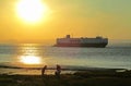 Neptune lines vehicle carrier ship sailing along the Bristol Channel towards Portbury docks under a beautiful sunset 08-06-2023 Royalty Free Stock Photo