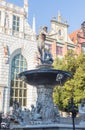 Neptune`s Fountain Statue at Long Market Street, the symbol of the city of Gdansk in Poland.