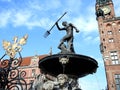 Neptune sculpture and church clock, Poland