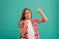Nerd party. Cute nerd. Child charming turquoise background. Girl hold eyeglasses for party. Child with eyeglasses copy