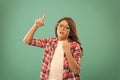 Nerd party. Cute nerd. Child charming turquoise background. Girl hold eyeglasses for party. Child with eyeglasses copy