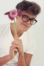 Nerd with pink flowers Royalty Free Stock Photo