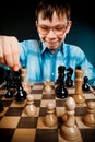 Nerd play chess Royalty Free Stock Photo