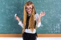 Nerd pupil blond girl in green board schoolgirl