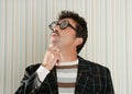 Nerd silly crazy myopic glasses man funny gesture Royalty Free Stock Photo