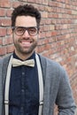 Nerd Student Making a Funny Awkward Smiling Face - Stock image