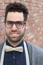 Nerd Student Making a Funny Awkward Smiling Face - Stock image