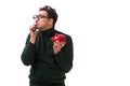 The nerd young man with piggybank isolated on white Royalty Free Stock Photo