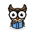 A nerdy cute owl animal cartoon character reading a book Royalty Free Stock Photo