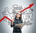 Nerdy girl and business strategy, red graph Royalty Free Stock Photo