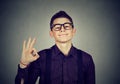 Nerdy man showing ok sign