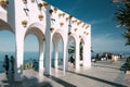 People walking near Balcon de Europa in resort town of Nerja in Royalty Free Stock Photo