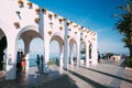 People walking near Balcon de Europa in resort town of Nerja in Spain. Royalty Free Stock Photo