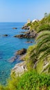 Nervi. Genoa, Italy. View of the sea from the coast of Nervi, near Genoa, on a warm and sunny October day. Vegetation and Royalty Free Stock Photo