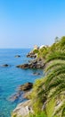 Nervi. Genoa, Italy. View of the sea from the coast of Nervi, near Genoa, on a warm and sunny October day. Vegetation and Royalty Free Stock Photo