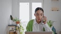 Nervous businesswoman talking phone at remote workplace closeup. Angry lady call