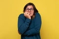 Nervous confused woman biting nails on her fingers in panic, depression Royalty Free Stock Photo