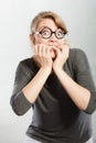 Nervous girl biting nails. Royalty Free Stock Photo