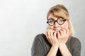 Nervous girl biting nails Royalty Free Stock Photo