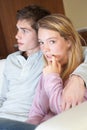 Nervous Teenage Girl Sitting On Sofa At Home Royalty Free Stock Photo