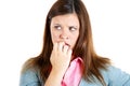 Nervous woman biting her nails craving for something or anxious Royalty Free Stock Photo