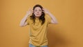 Nervous woman having a breakdown arguing moving hands and shouting making a scene while feeling angry Royalty Free Stock Photo