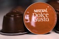 A nescafe capsule from a nescafe dulce gusto machine