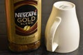 Nescafe Gold Blend instant coffee and cup