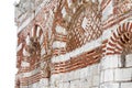 Old Town of Nesebar. Stone facade of the church. Ceramic facade inserts. Typical brick and stone masonry, authentic patterns Royalty Free Stock Photo