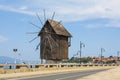 NESEBAR, BULGARIA - JUNE 07, 2019: windmill and road to old historical centre of the town Nesebar.