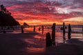 Ocean Beach Dramactic Sunset and Red Sky Water Refleection Royalty Free Stock Photo