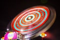 Nessebar, Bulgaria - 08/26/2018: Fun-fair at long exposure. Light trails motion. Carousel lights and movements.