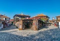 Nessebar, Bulgaria - 2 Sep 2018: Beautiful old wooden houses on the streets of Nesebar ancient city on a sunny day with blue sky.