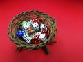 Nest with colored dice inside Royalty Free Stock Photo