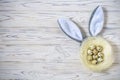 A nest with colored Easter eggs and bunny ears at home on Easter Royalty Free Stock Photo