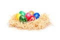 Easter - Colorful Eggs in a Wood Wool Nest Royalty Free Stock Photo