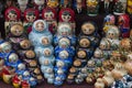 Nesting dolls in a street market as souvenir of Russia. Background
