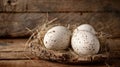 Three eggs nest wooden table Royalty Free Stock Photo