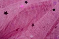 Net Fabric with embellishment of star and circle. Pink colorful netting material.