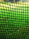 Net pattern with dew drop Royalty Free Stock Photo