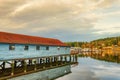 A net shed reflects in the Puget Sound at Gig Harbor