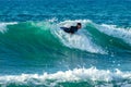 12/18/2018 Netanya, Israel, the surfer rides on the wave and perform tricks on a wave