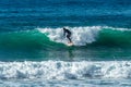 12/18/2018 Netanya, Israel, the surfer rides on the wave and perform tricks on a wave