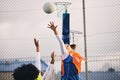 Netball, goal shooting and defense of a girl athlete group on an outdoor sports court. Aim, sport game and match Royalty Free Stock Photo